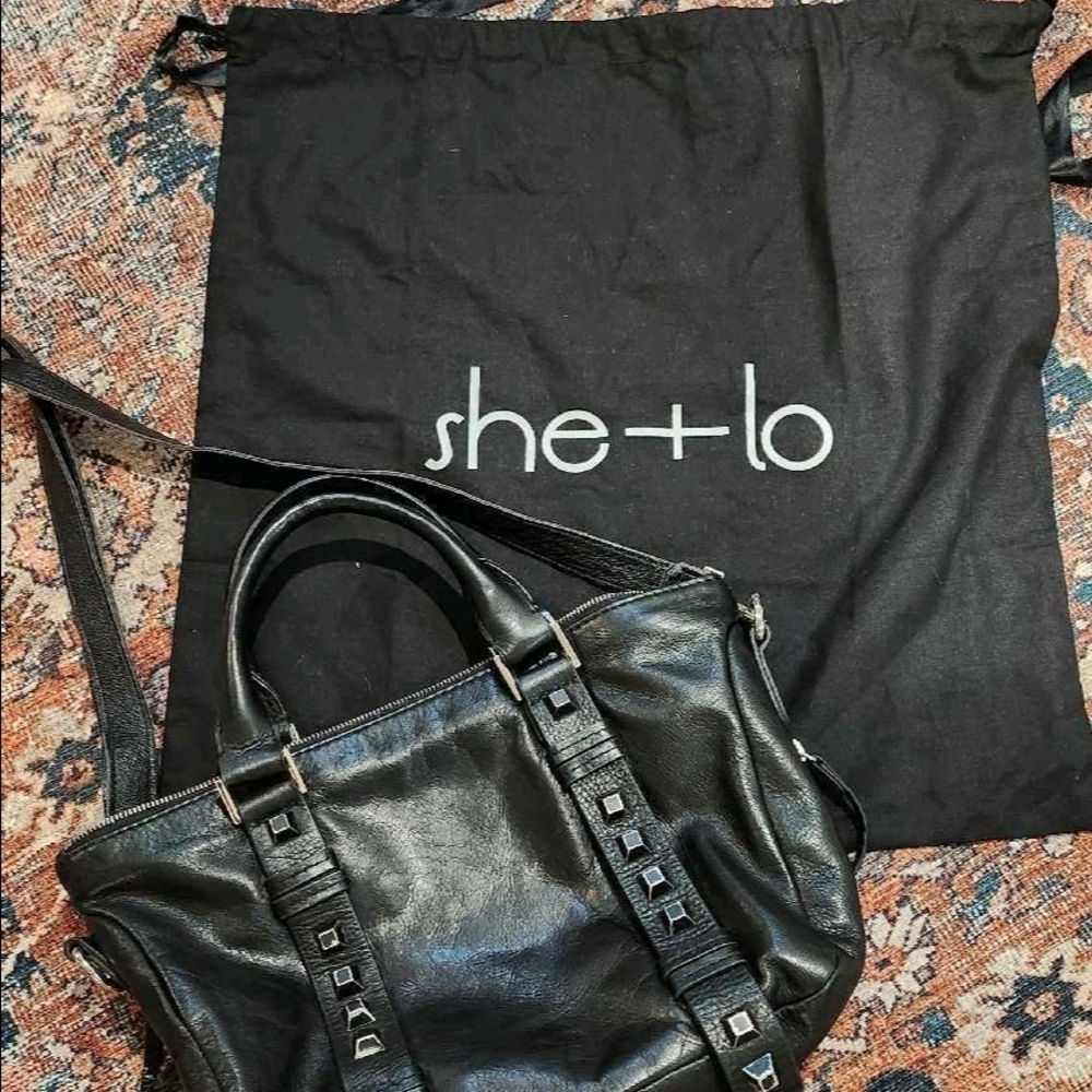 Black Satchel with Adjustable Straps and Matte Finish